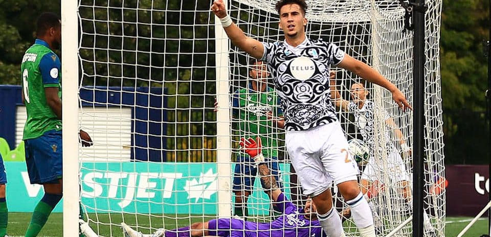 Player celebrating a goal during Pacific FC match