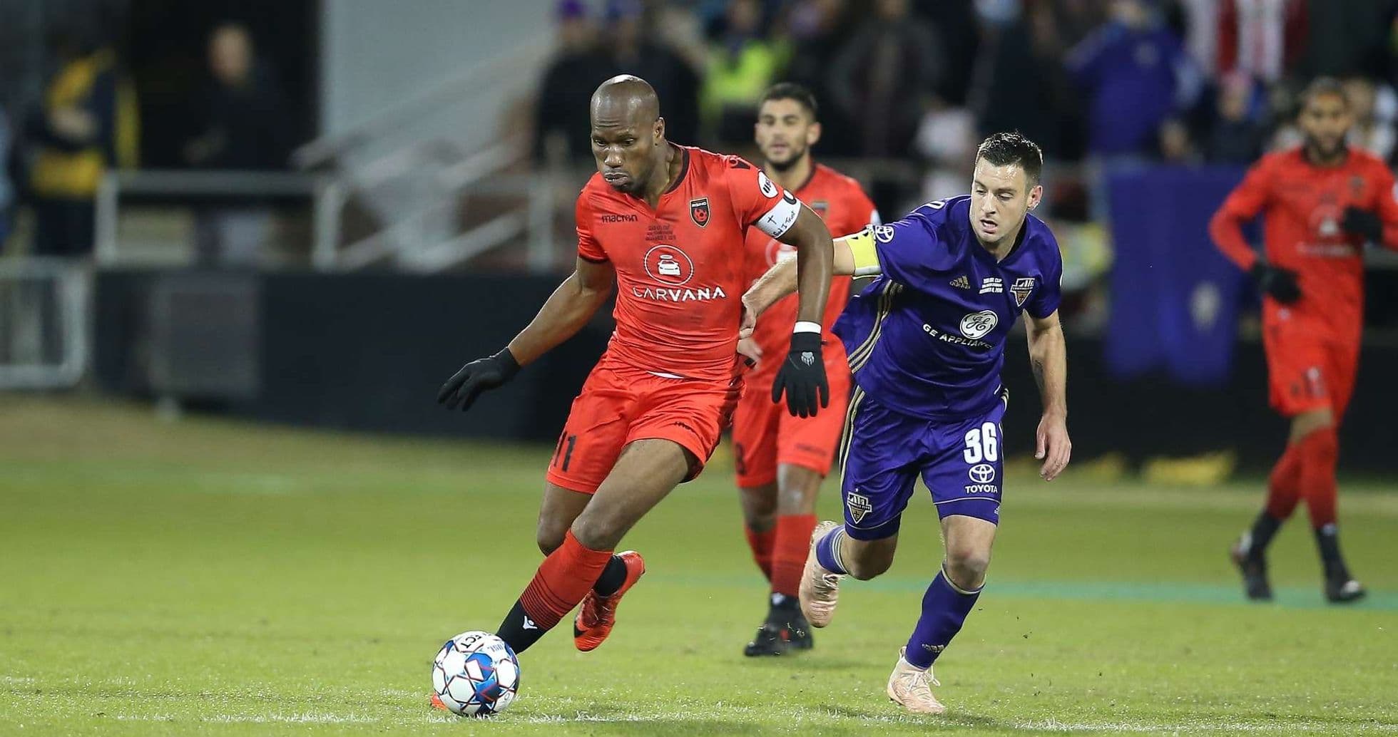 Player dribbling during Phoenix Rising match