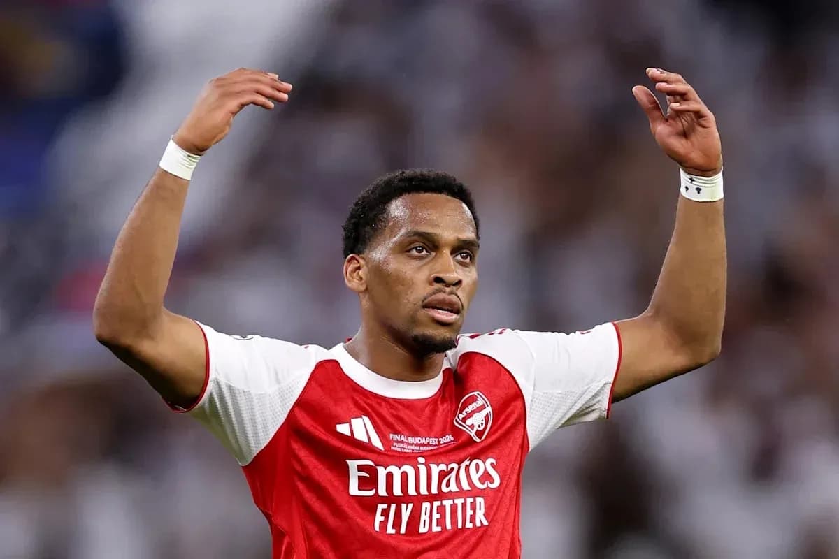 Player gesturing during match in Arsenal jersey