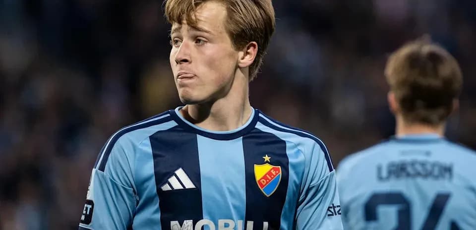 Player in blue jersey during a football match