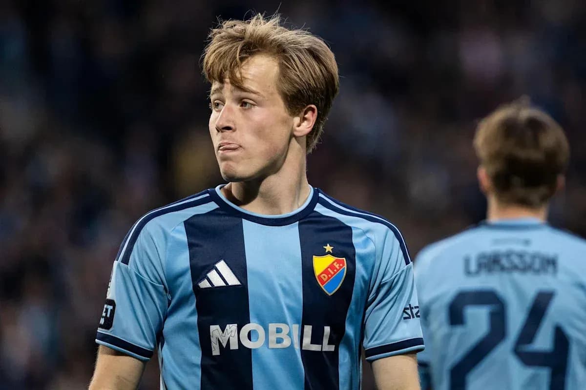 Player in blue jersey during a football match
