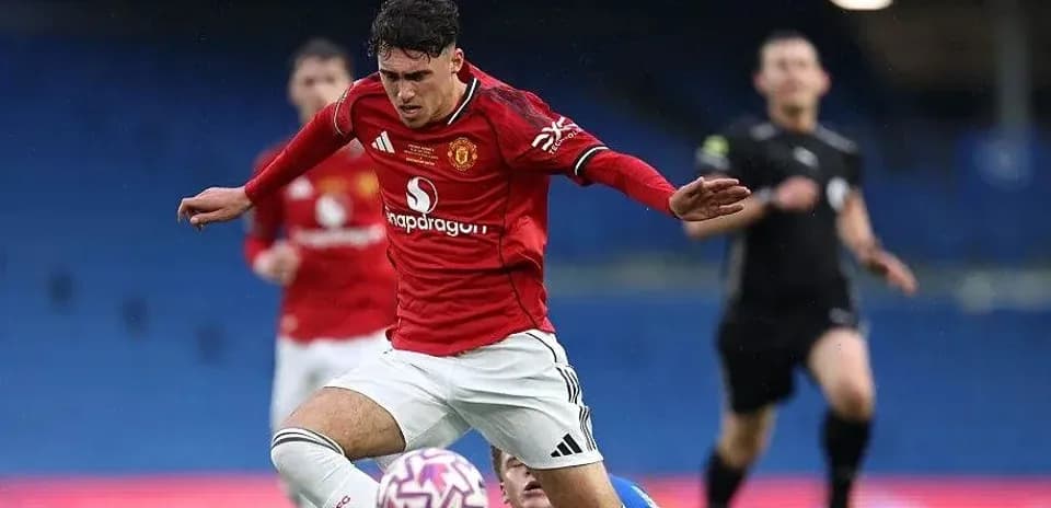 Player in red jersey falls while contesting ball