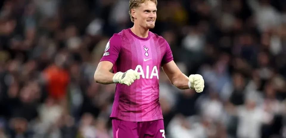 Goalkeeper celebrating in Tottenham kit during match
