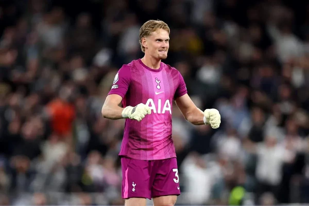 Goalkeeper celebrating in Tottenham kit during match