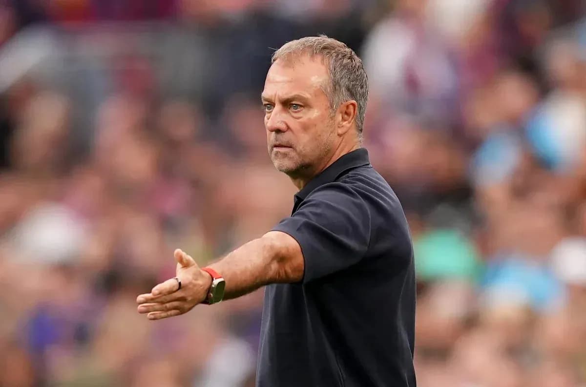 Coach gesturing during a match from the sidelines