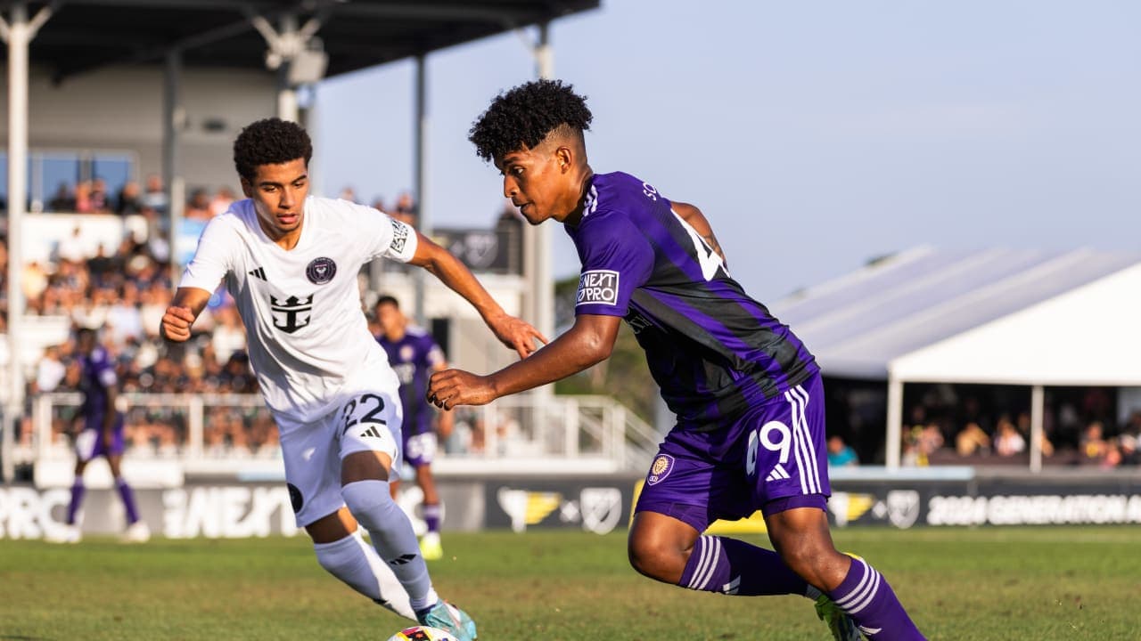 New England II player challenges Orlando City II player