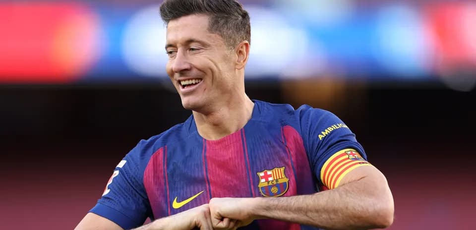 Player celebrating in Barcelona jersey at stadium