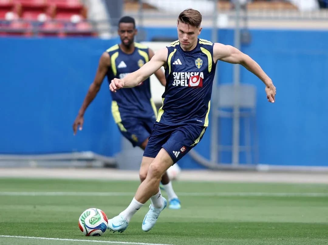 Swedish player kicking a football during practice