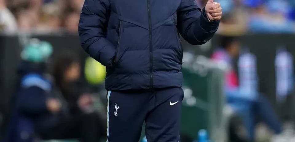 Manager giving a thumbs up on the sideline
