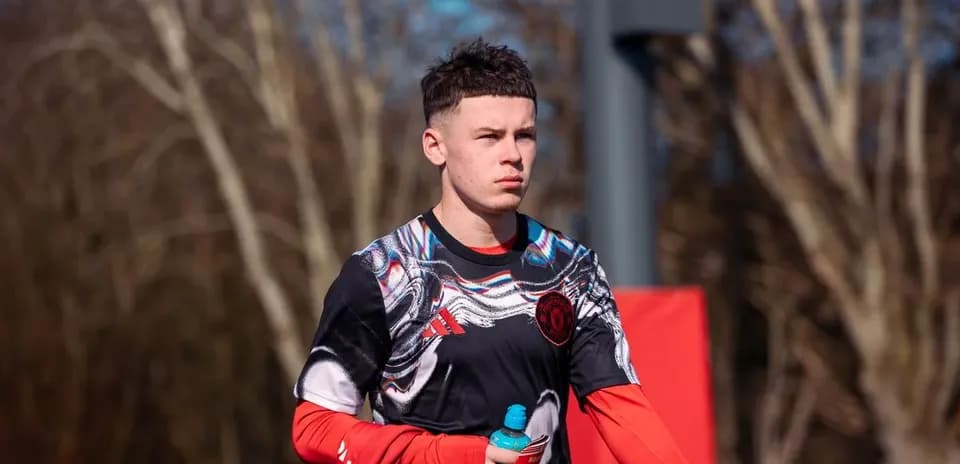 Player walking with water bottle during training session