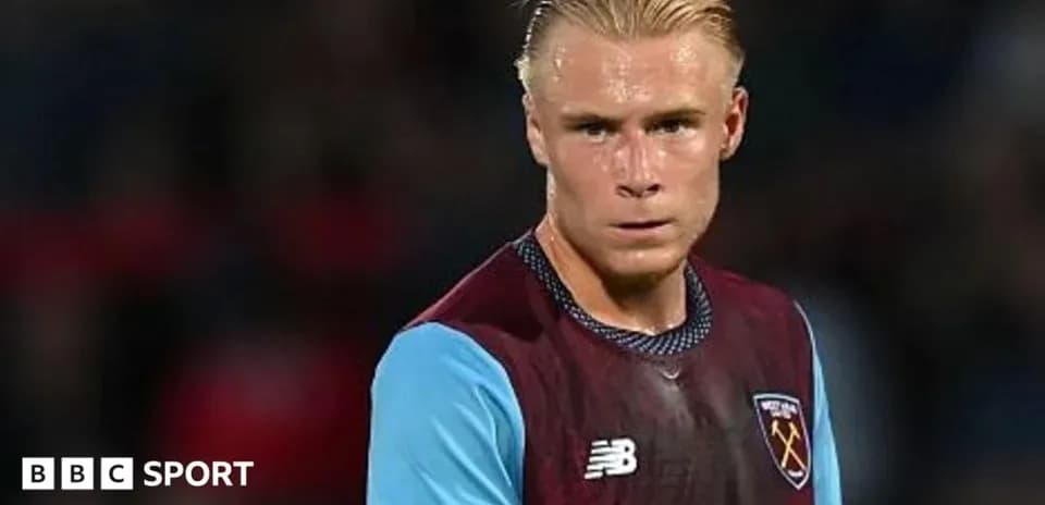Player in West Ham kit during match action