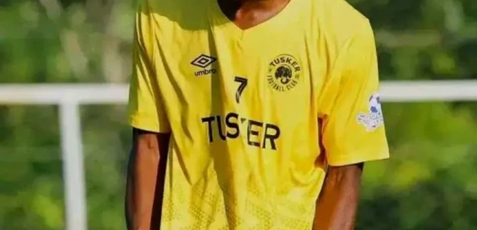 Player celebrating in yellow jersey during match