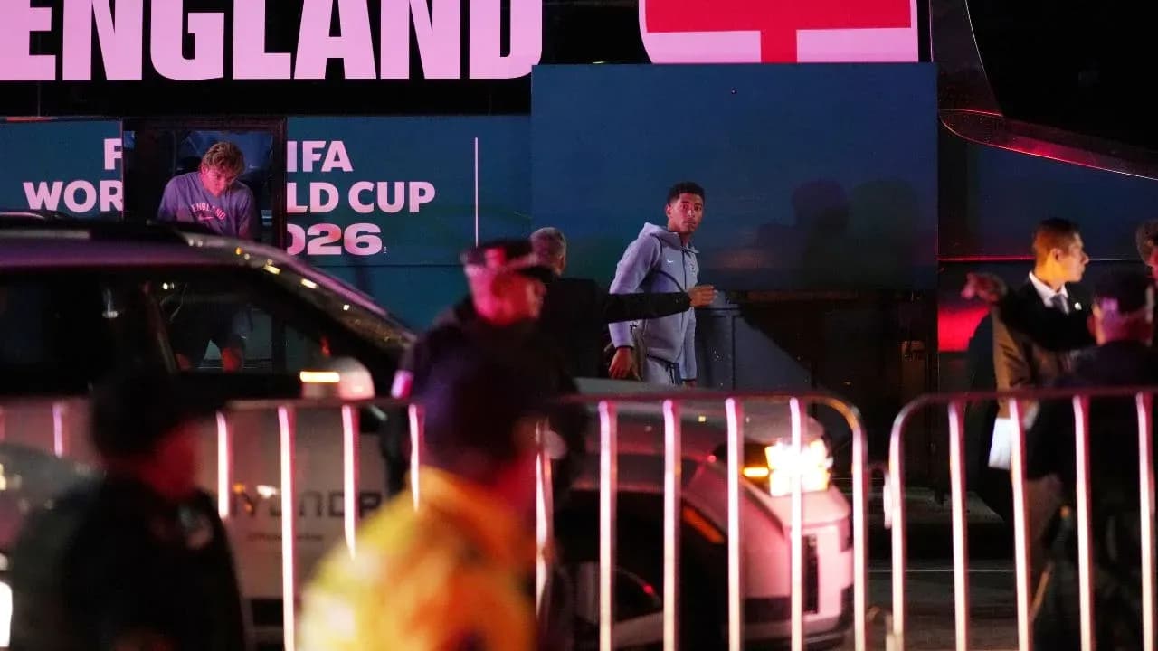 Players arriving at England team bus for World Cup