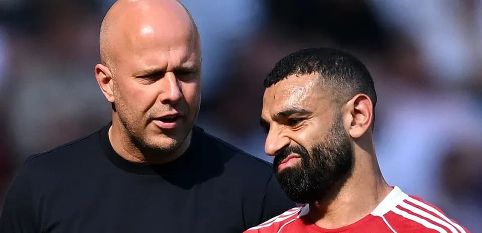 Two men talking during a sports event