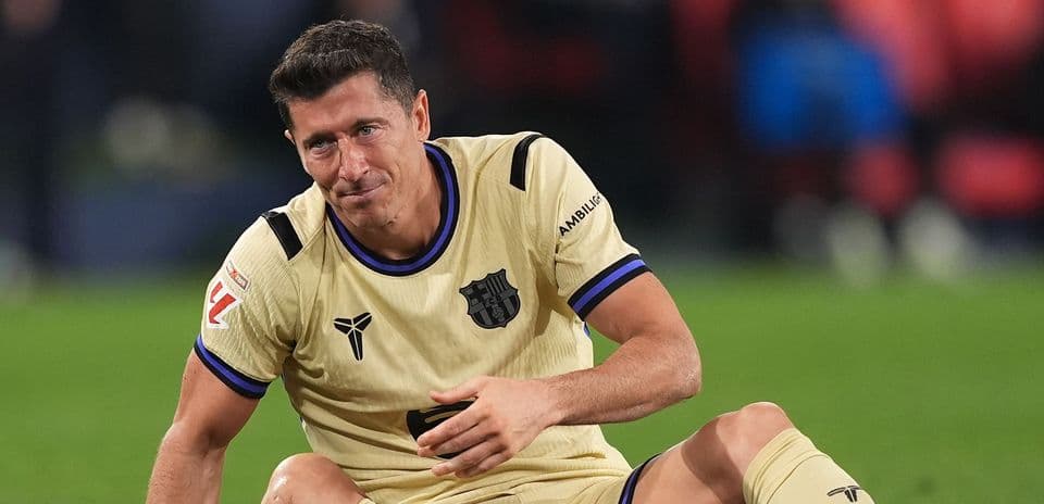 Player sitting on the pitch after a fall