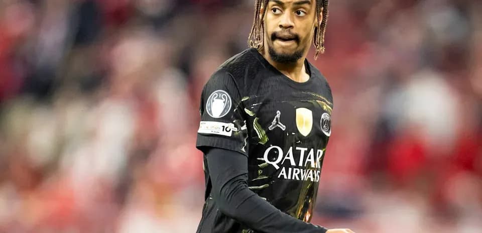 Player in black jersey during a football match
