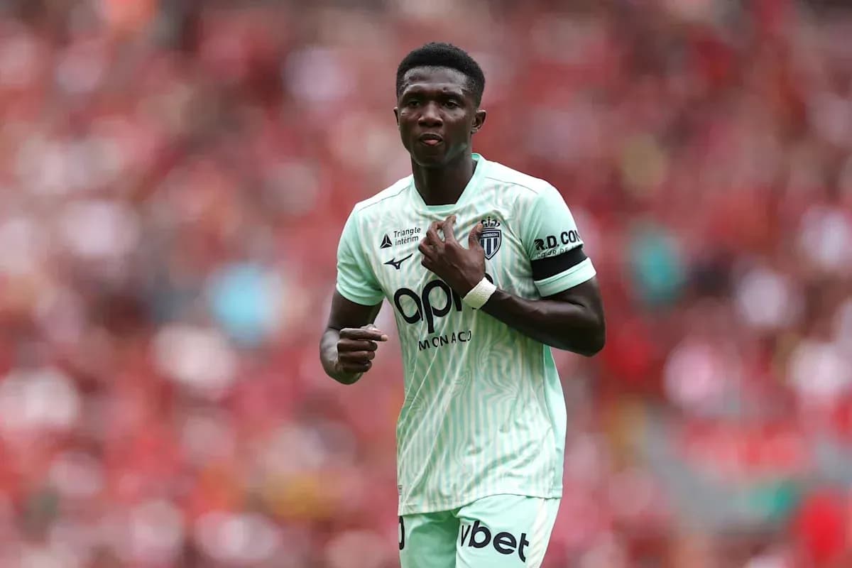 Player in light green jersey during match action