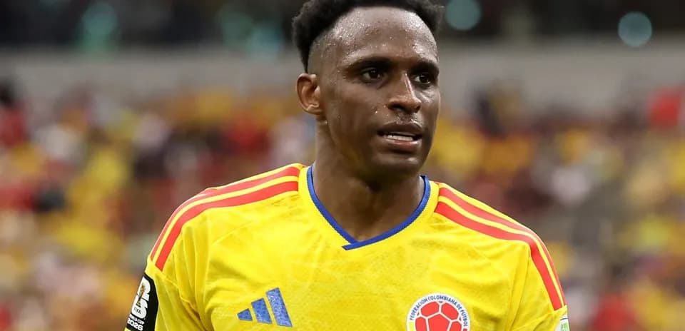 Colombian player in yellow jersey during match