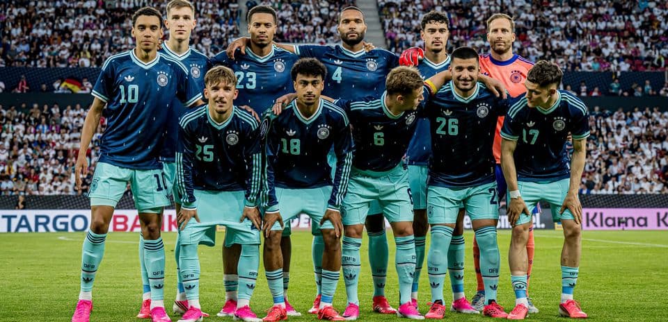 German national team posing for team photo on field