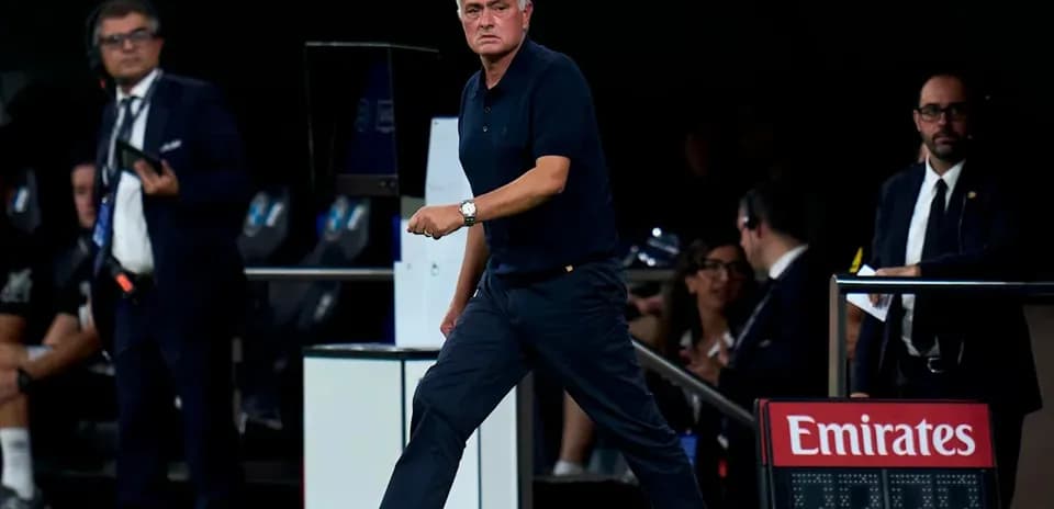 Manager walking on the sidelines during a match