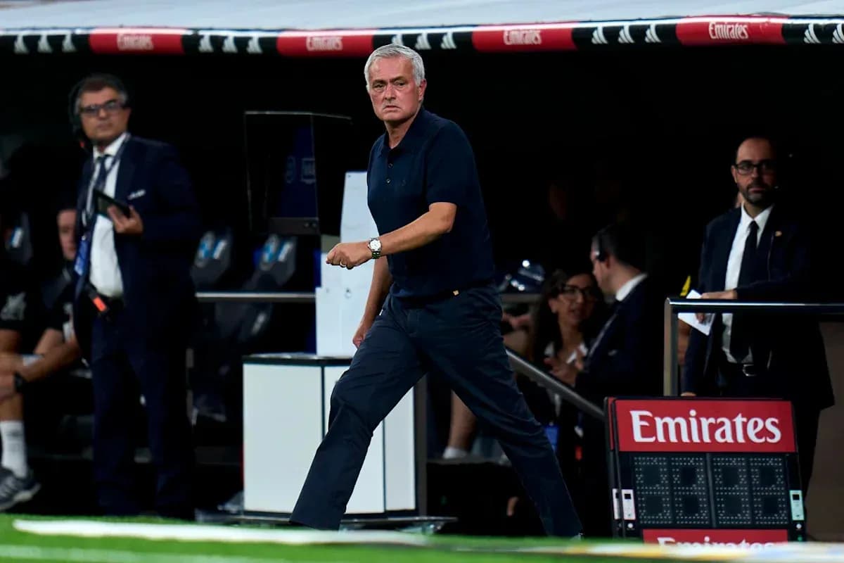 Manager walking on the sidelines during a match