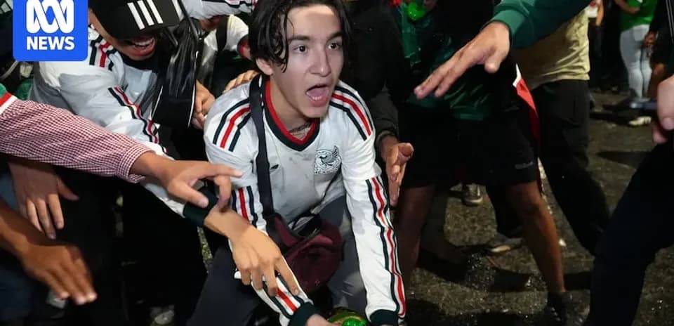 Fans celebrating with green items during event