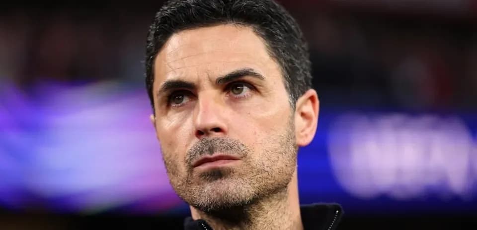 Coach focused during match with blurred background