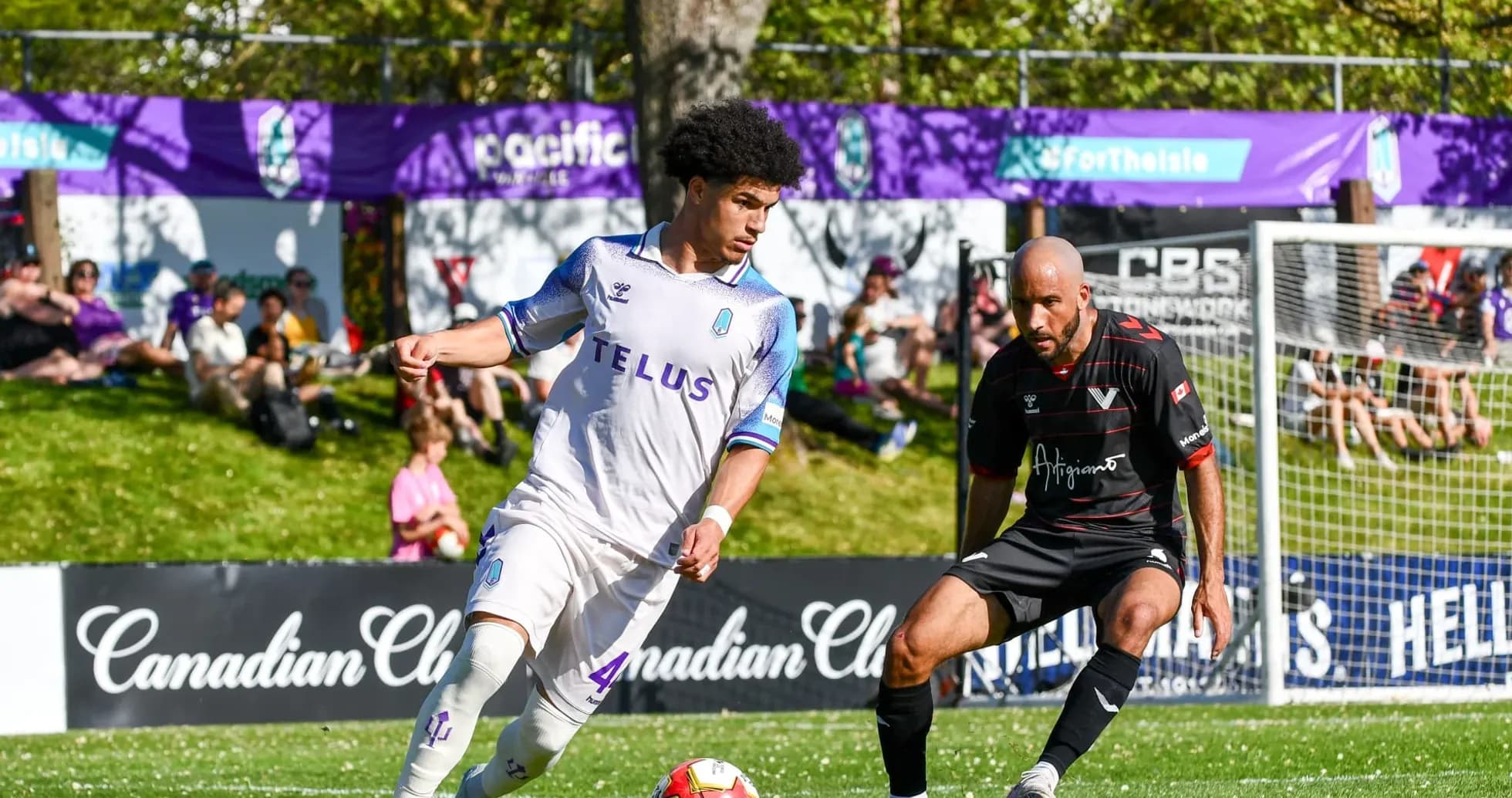 Pacific FC player dribbling against Vancouver FC