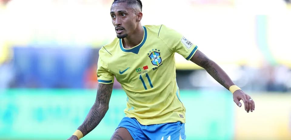 Brazilian player in yellow jersey running on field