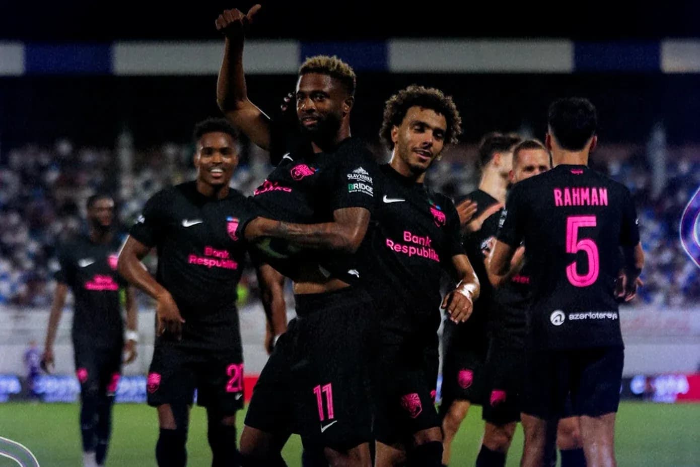 Players celebrating a goal during UEFA match