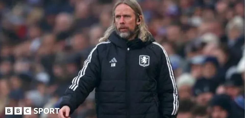 Manager directing players during a football match