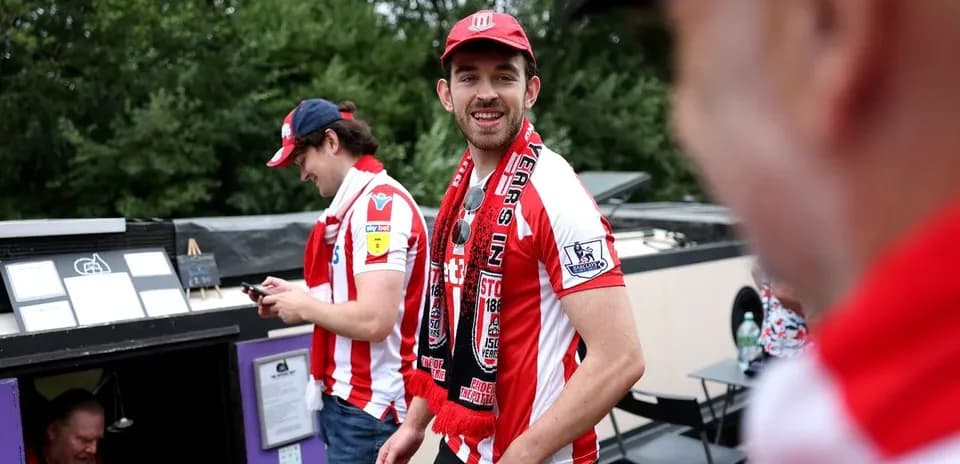 Fans wearing team colors at a gathering