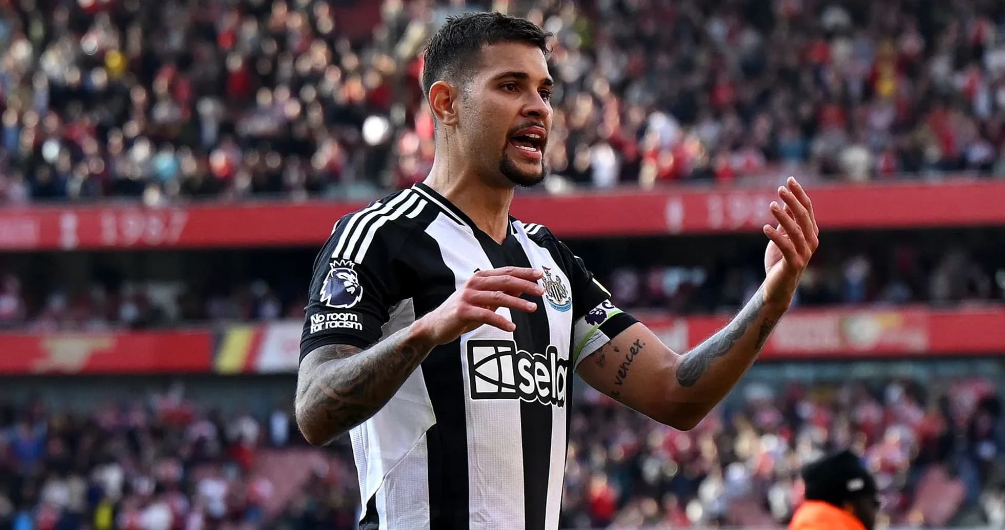 Newcastle player gesturing during a match