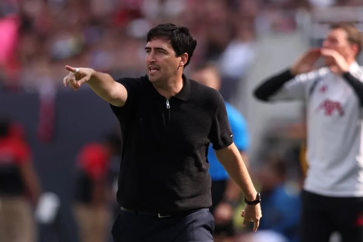 Coach directing players during a match