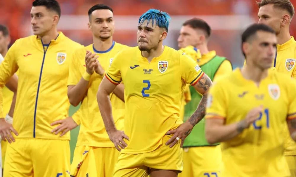 Romania team in yellow jerseys after match
