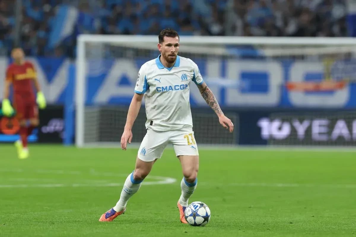 Player dribbling ball during UEFA Champions League match