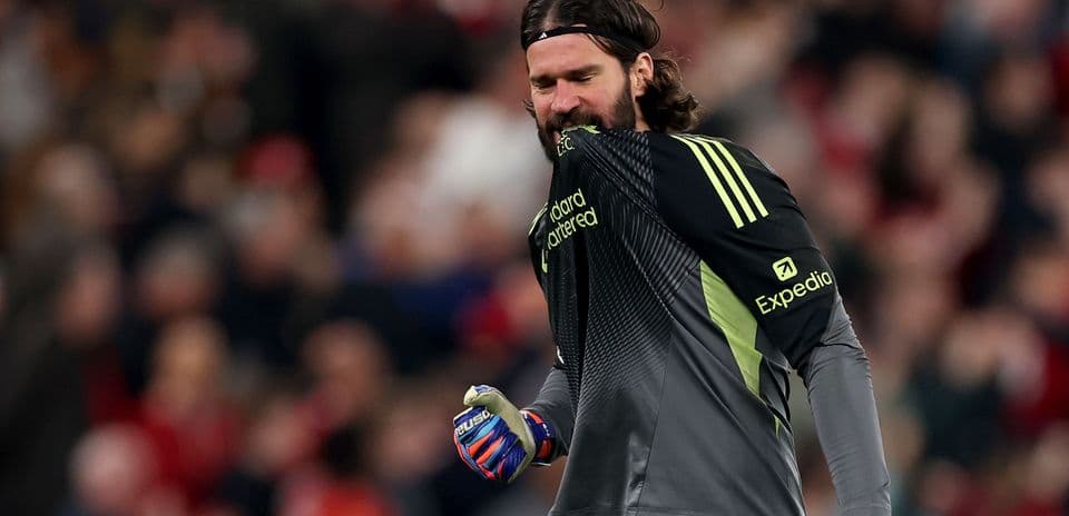 Goalkeeper celebrating with clenched fist during match