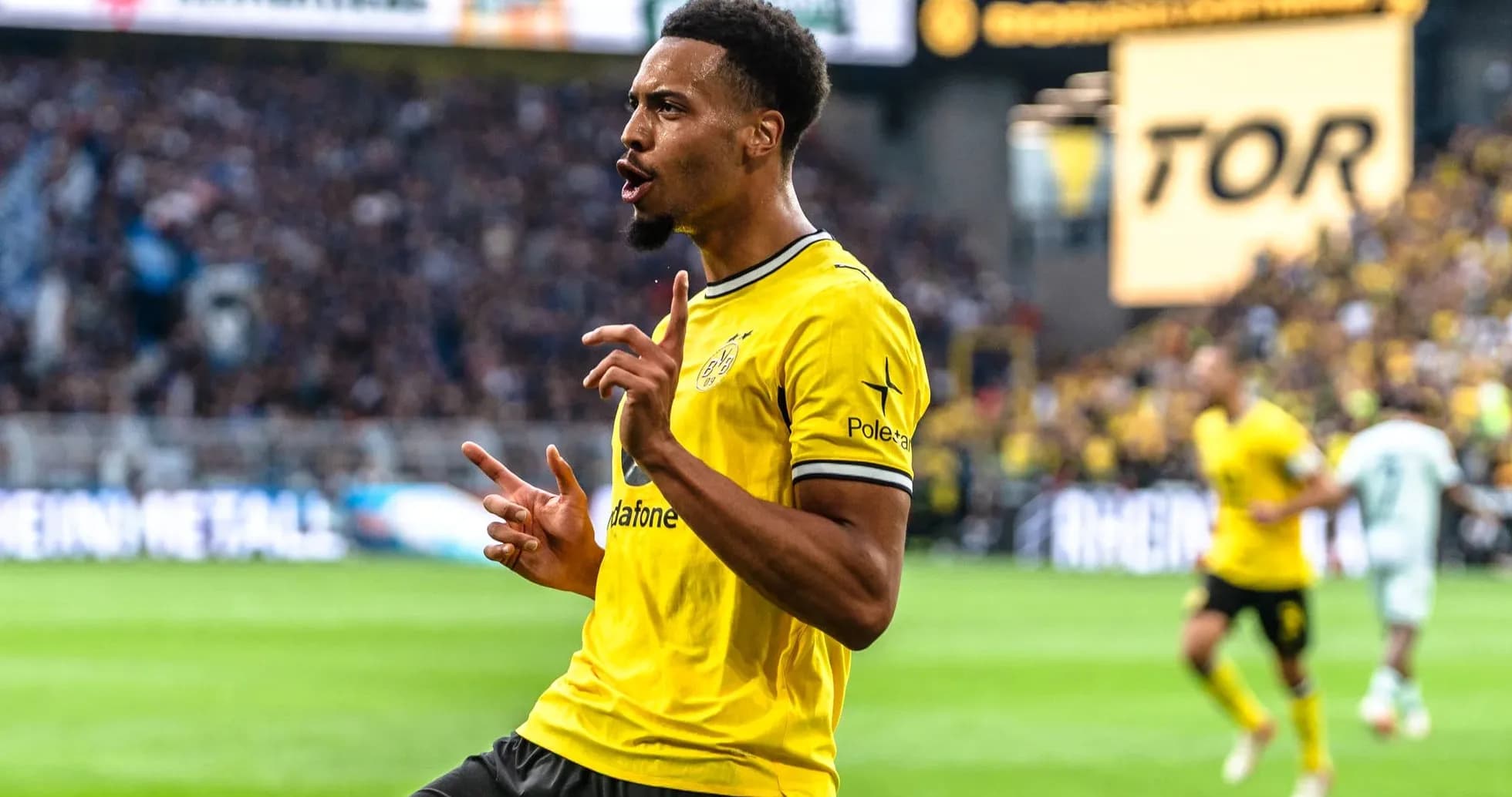 Player celebrating after scoring a goal in match