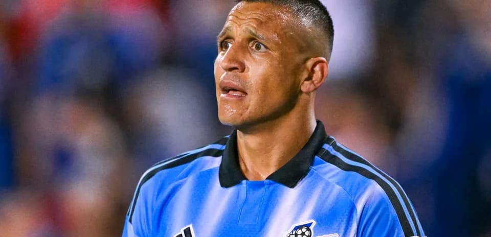 Goalkeeper in blue jersey during a match