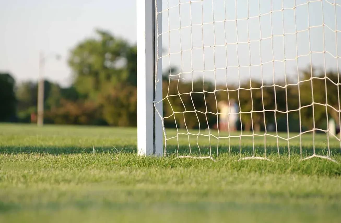 Close-up of a soccer goal on a field