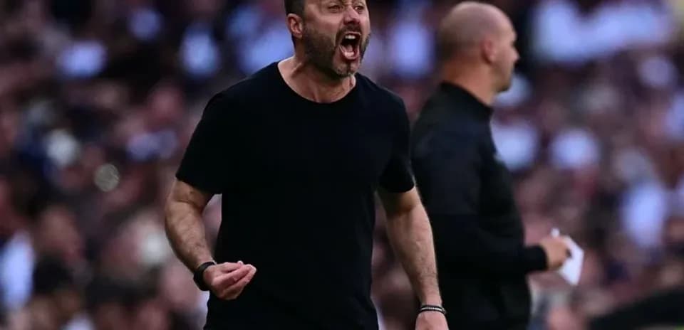 Coach passionately shouting during a match