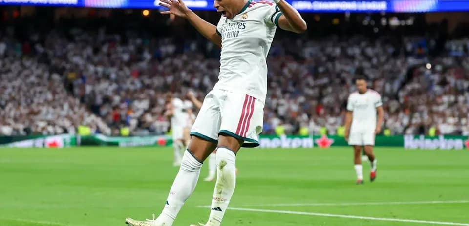 Player celebrating a goal on the pitch