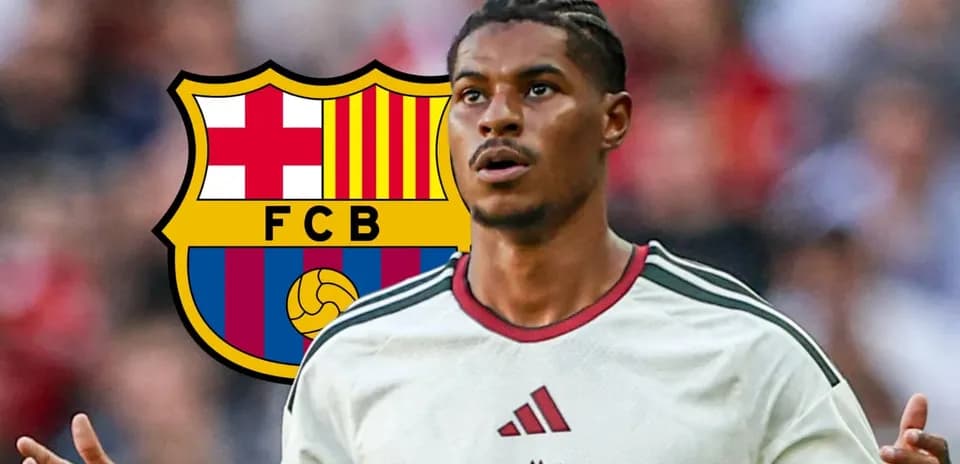 Player gesturing in front of FC Barcelona logo