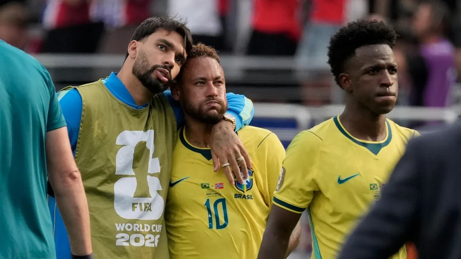 Brazil players walking off the field after match