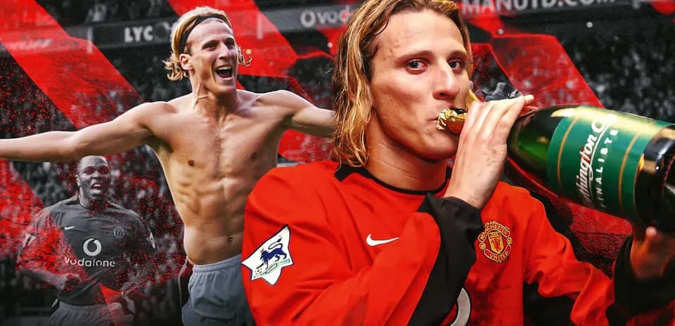Player celebrating with champagne in Manchester United kit