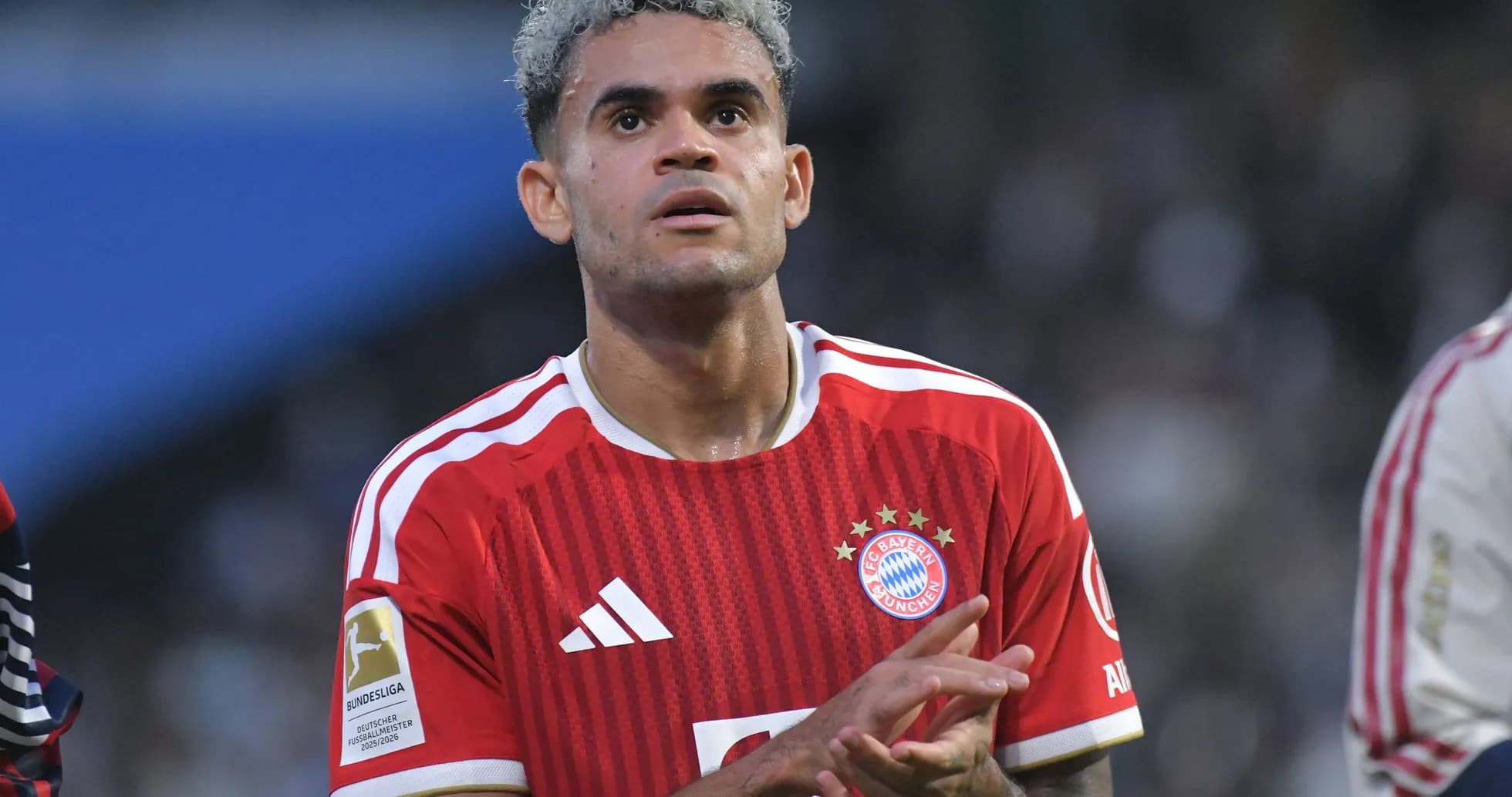 Bayern Munich player clapping during match