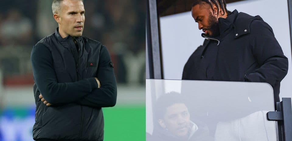 Coach and player observing from sidelines during match