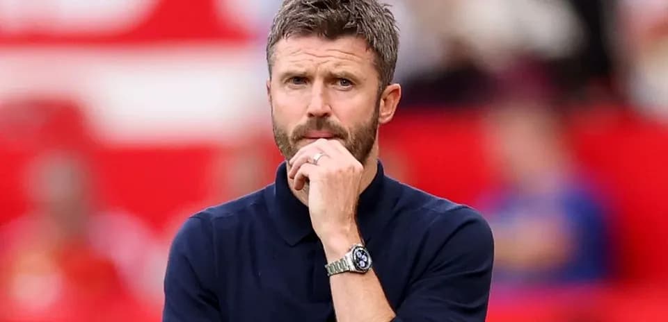 Coach observing the match from the sidelines
