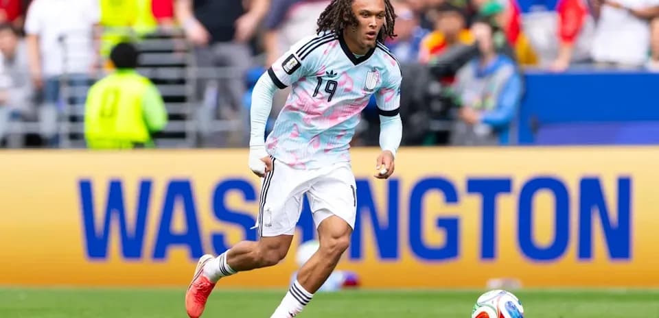 Player running with ball during soccer match