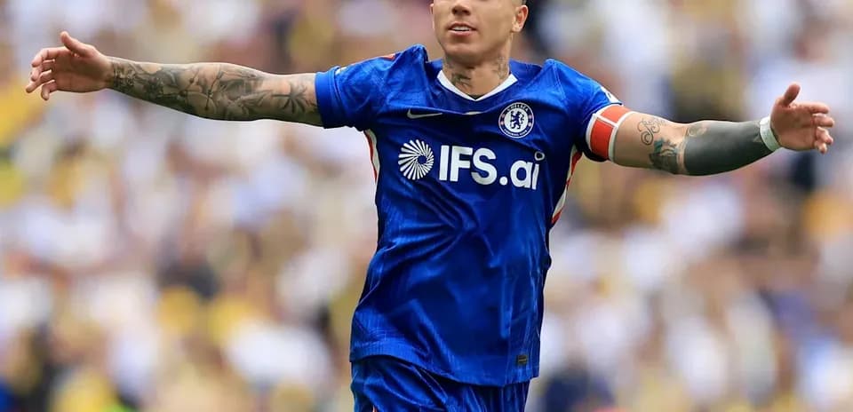 Chelsea player celebrating with outstretched arms